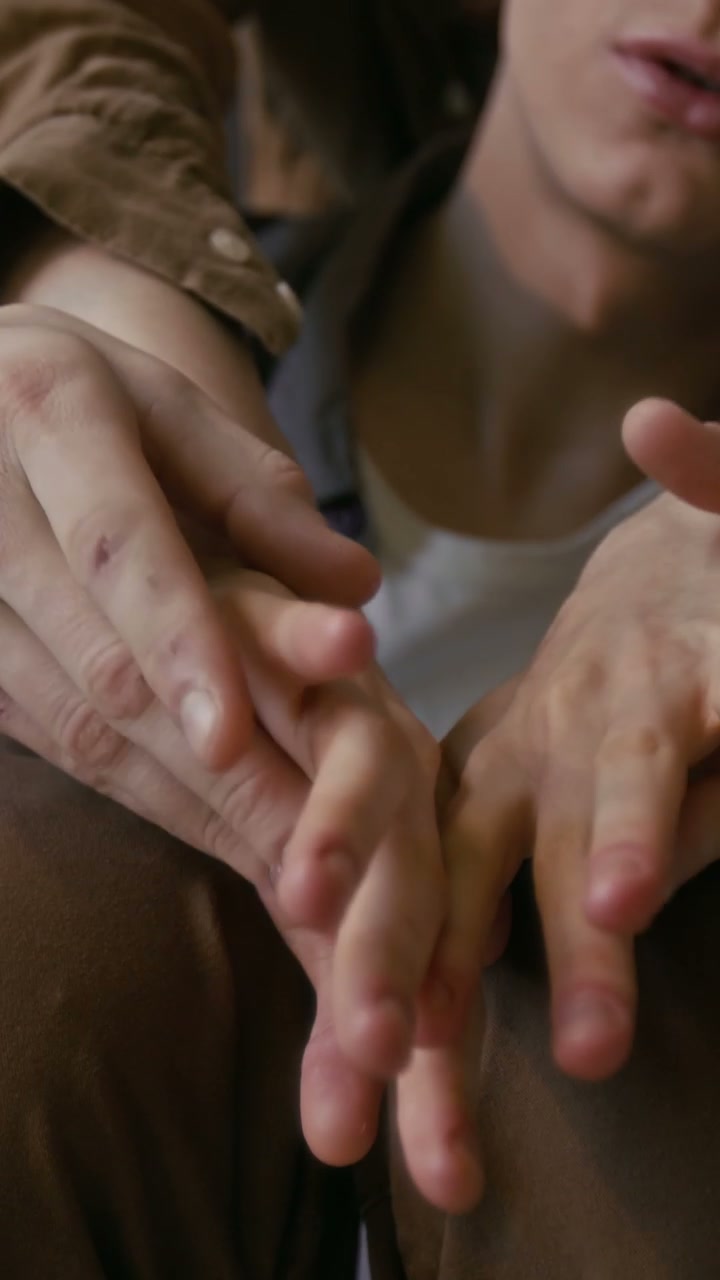 Tender Couple Holding Hands