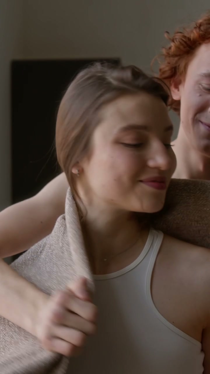 Romantic Couple Embracing at Home