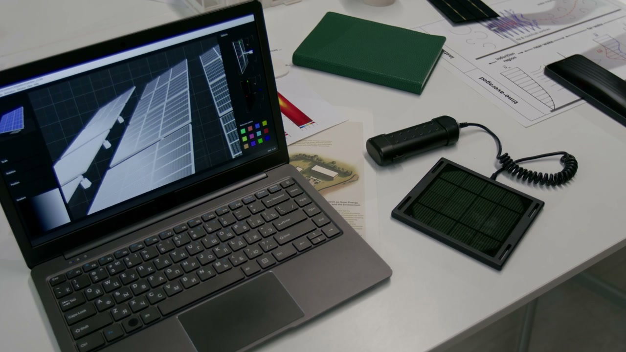 Laptop with 3D Solar Panel Design on Desk