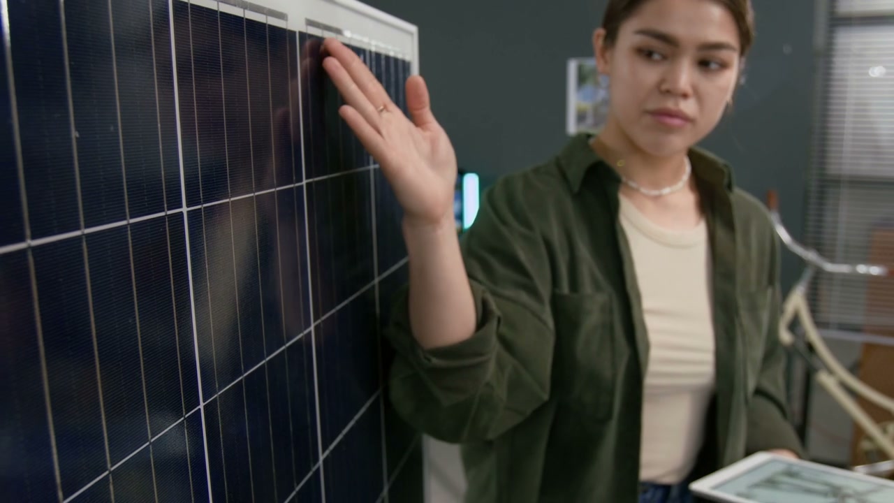 Woman Discussing Solar Panel Technology