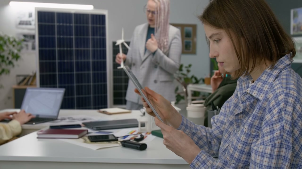 Renewable Energy Discussion in Modern Office