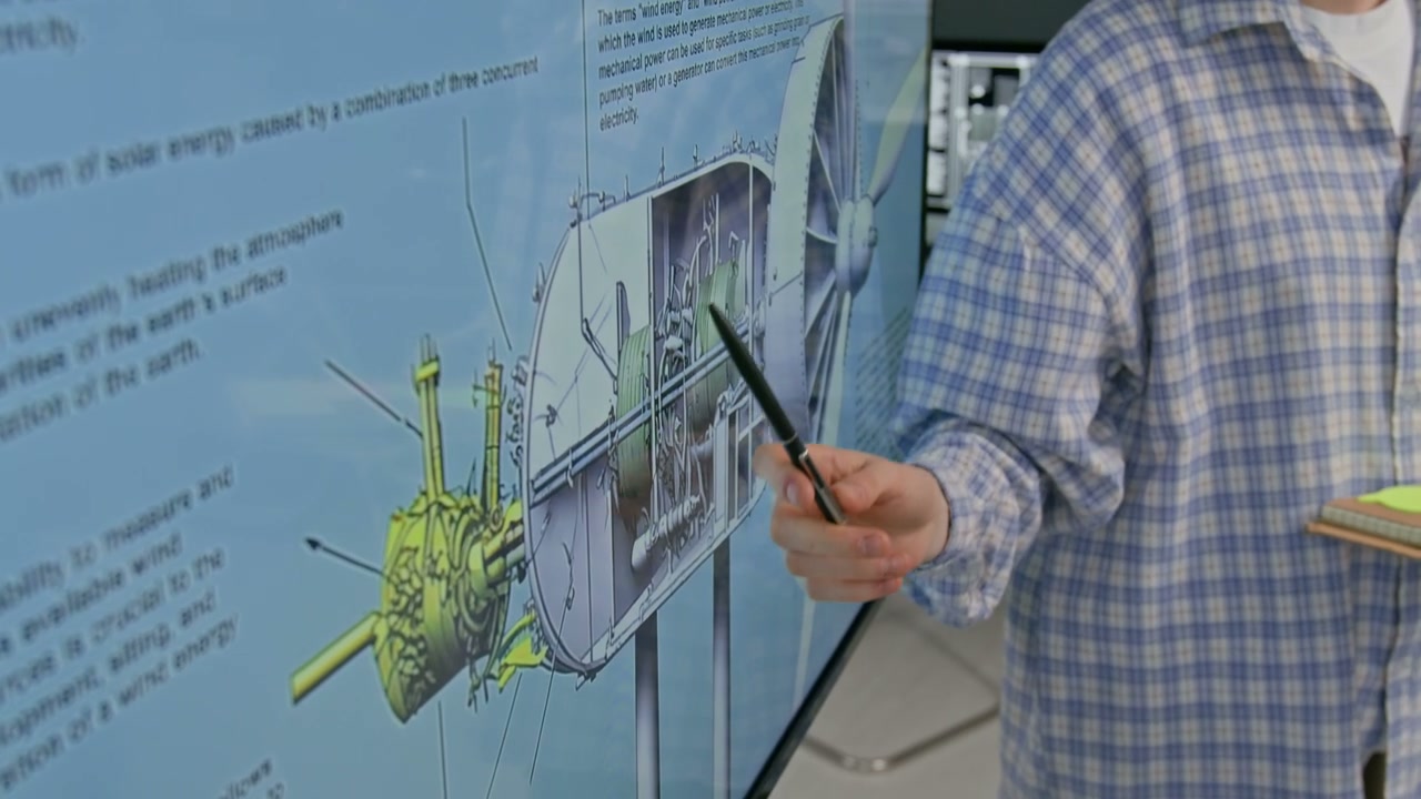 Engineer Explaining Wind Turbine Diagram