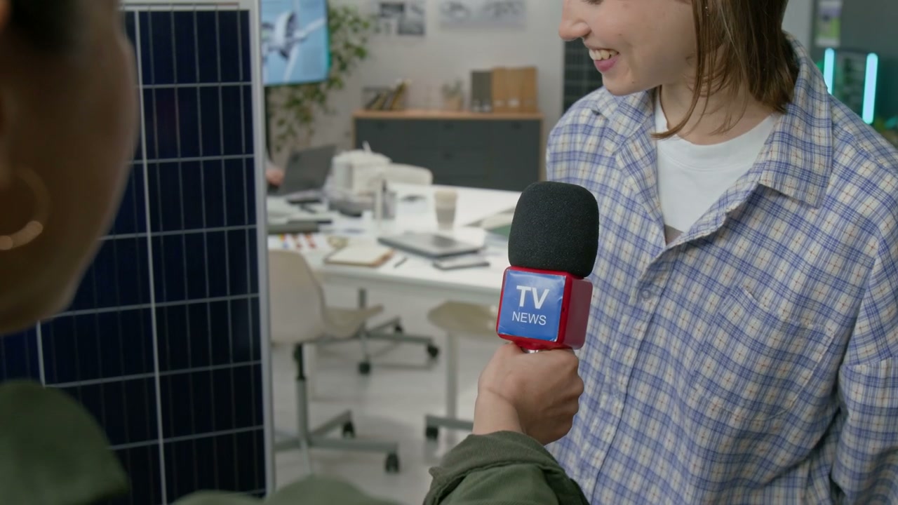 Journalist Interviews Woman About Solar Energy