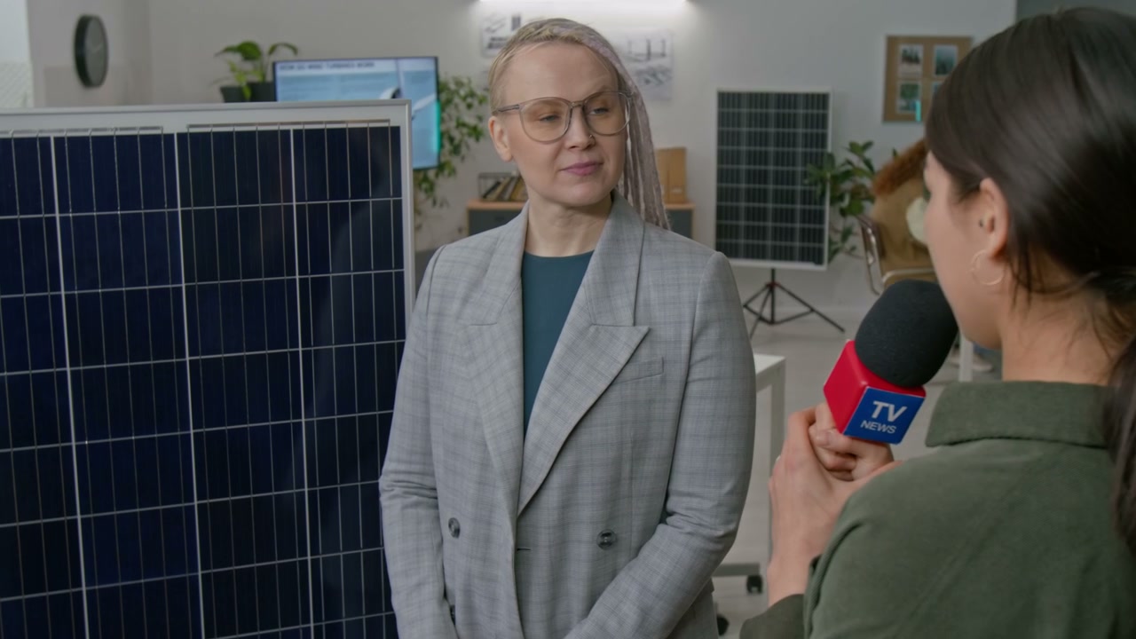 Woman Discusses Solar Energy in TV Interview