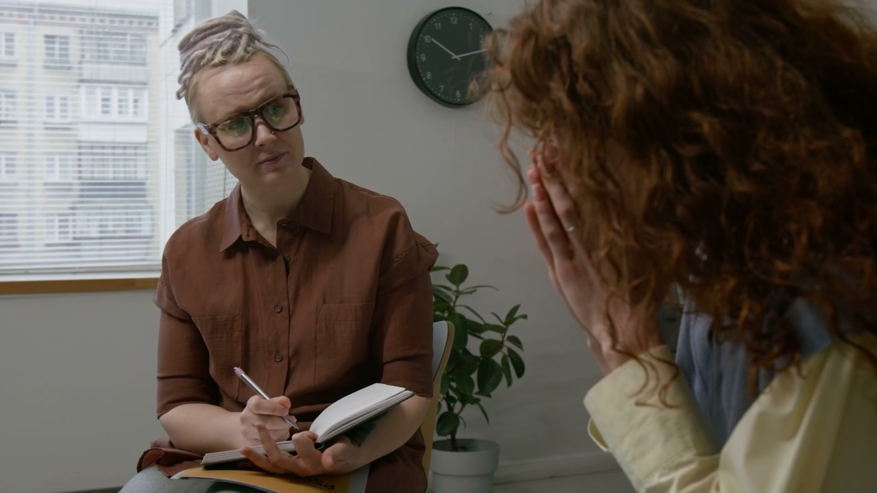 Therapist Listening to Client in Session