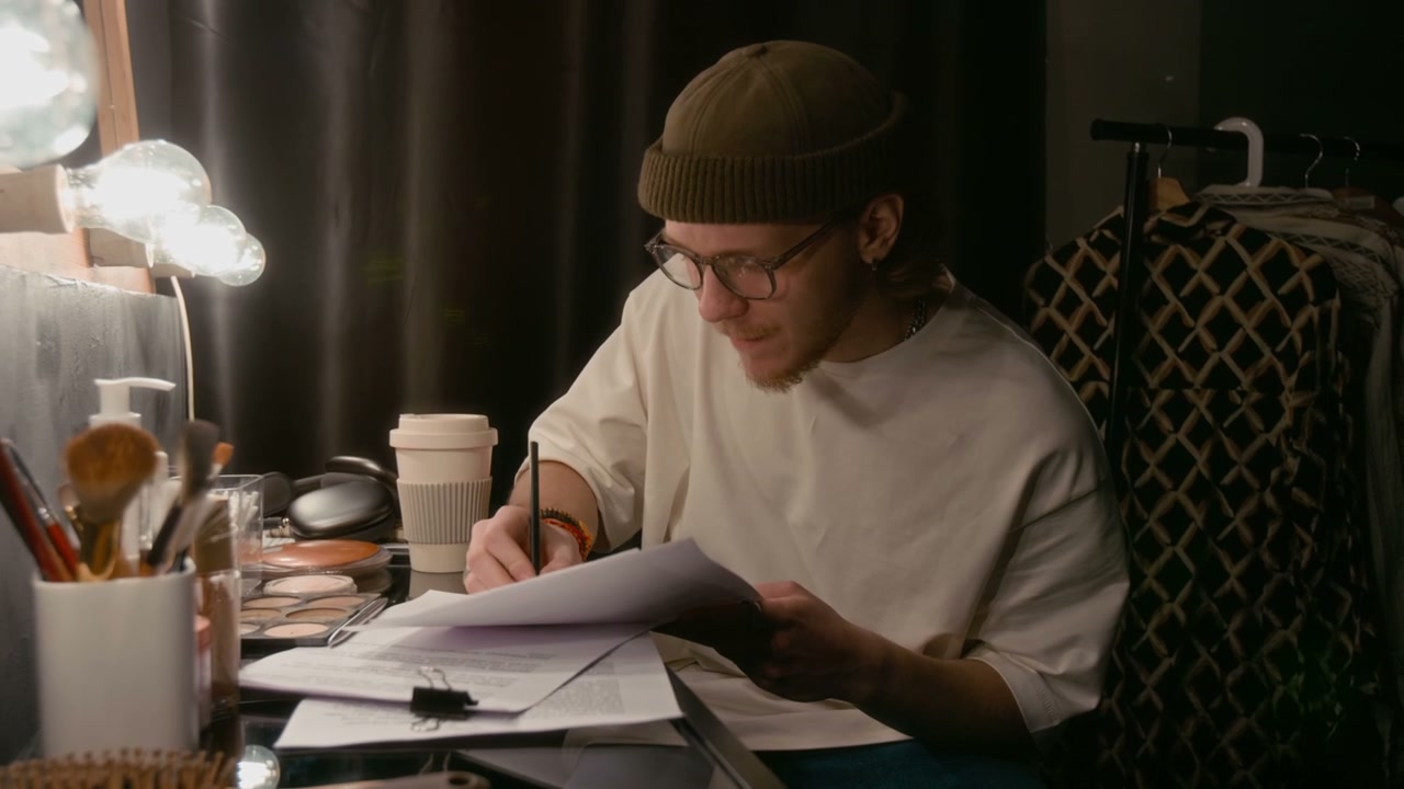 Comedian Rehearsing Script Backstage