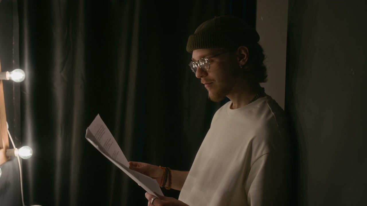 Comedian Rehearsing Script Backstage