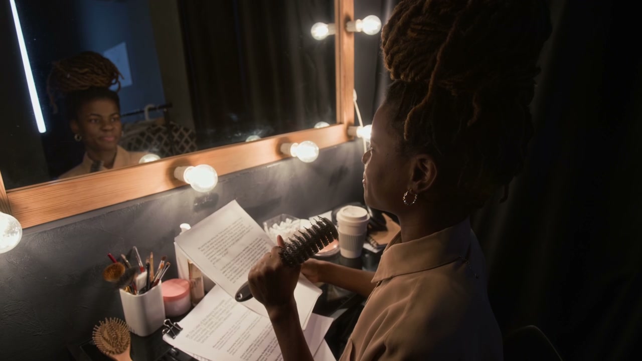 Comedian Rehearsing Stand-Up Routine Backstage