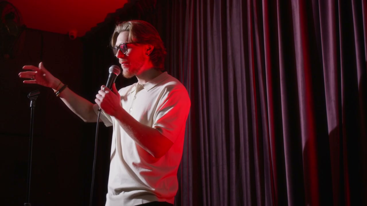 Comedian Performing Stand Up on Stage