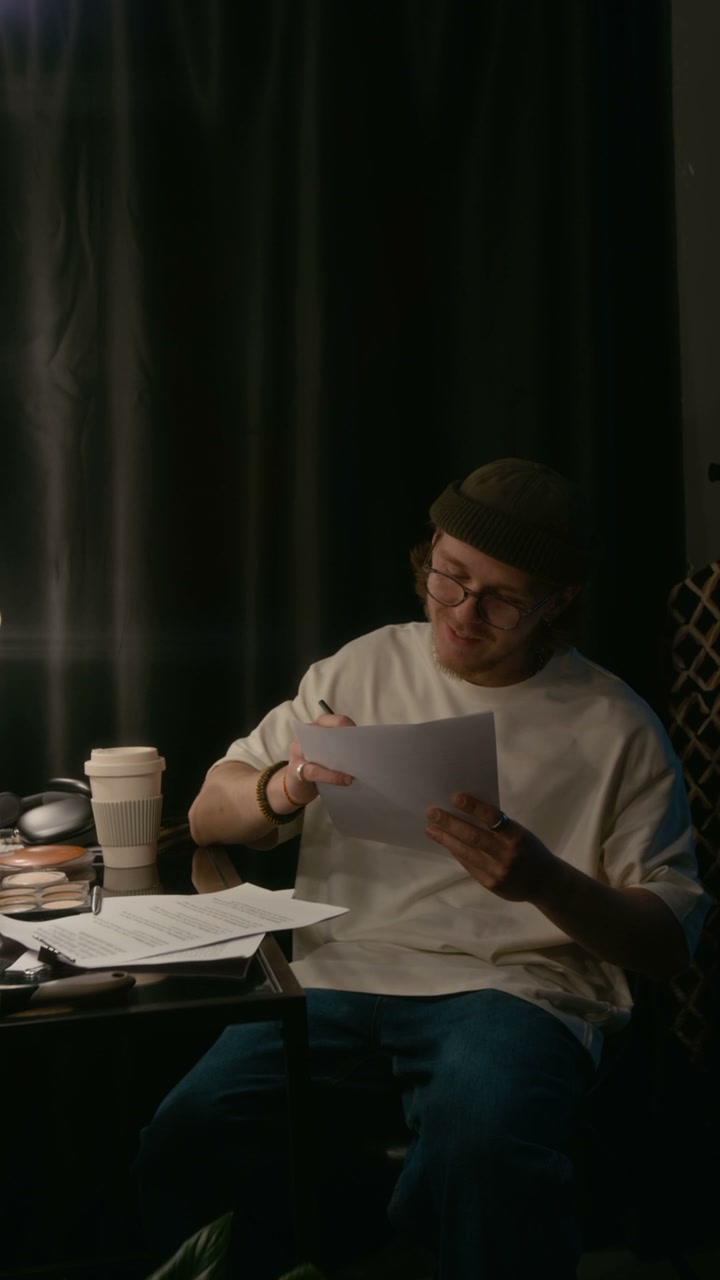 Comedian Rehearsing Script Backstage
