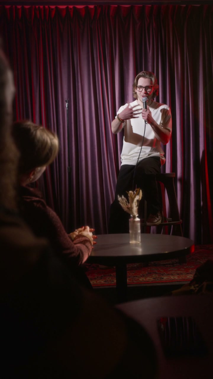 Stand-Up Comedian Performs On Stage