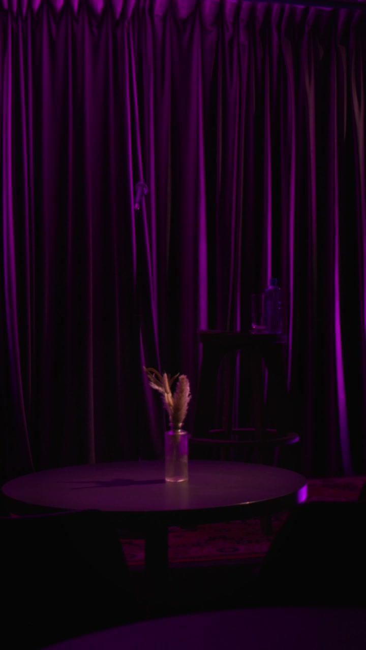 Empty Stand Up Comedy Stage with Purple Curtains