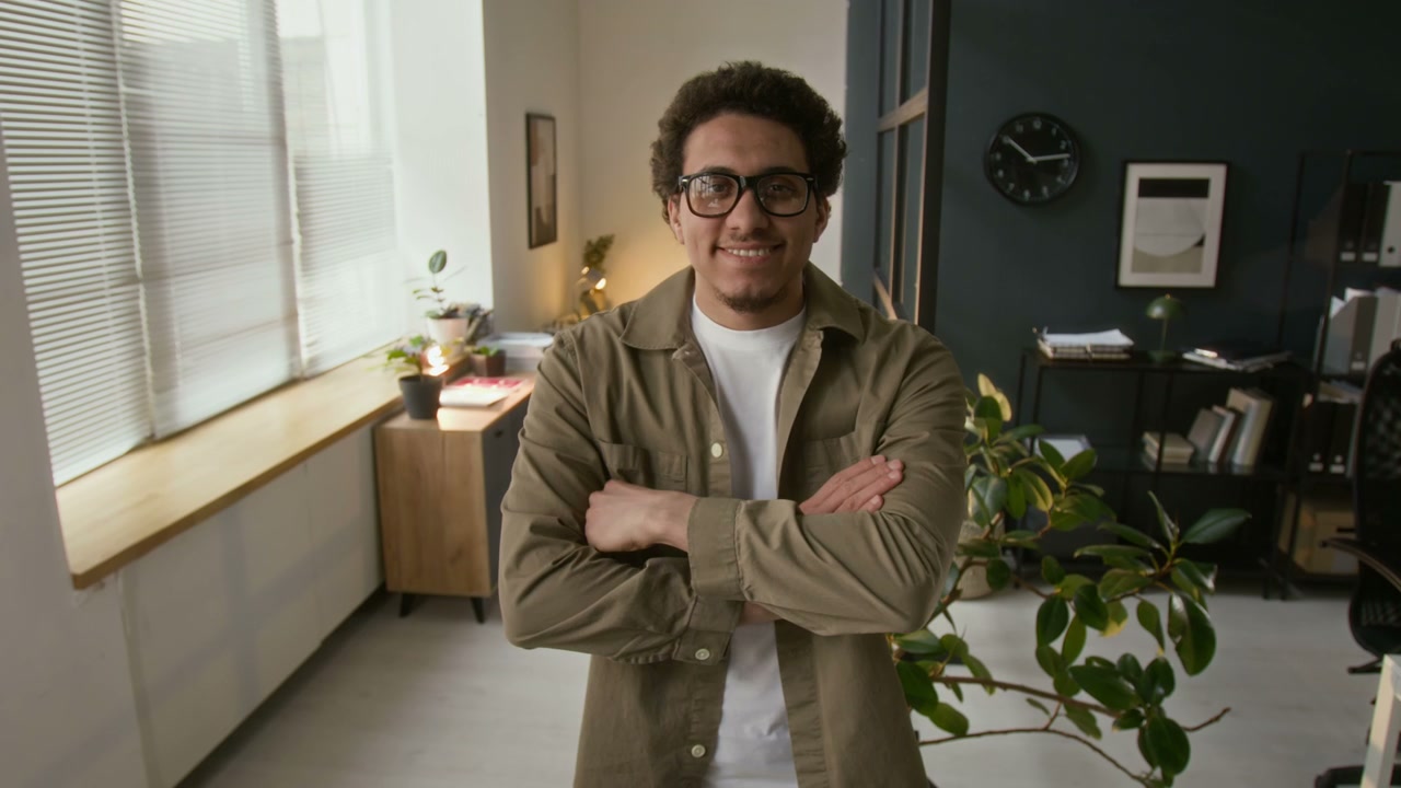 Young Businessman Posing in Modern Office