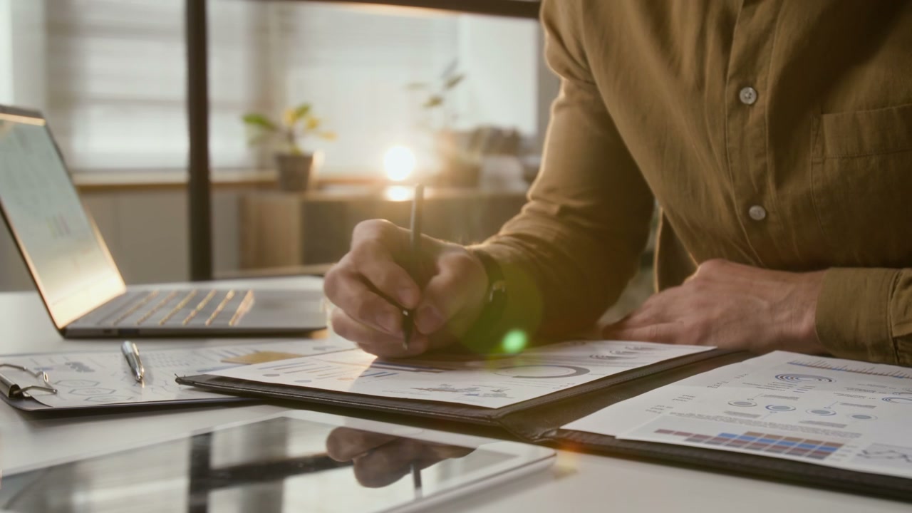 Businessman Analyzing Financial Reports