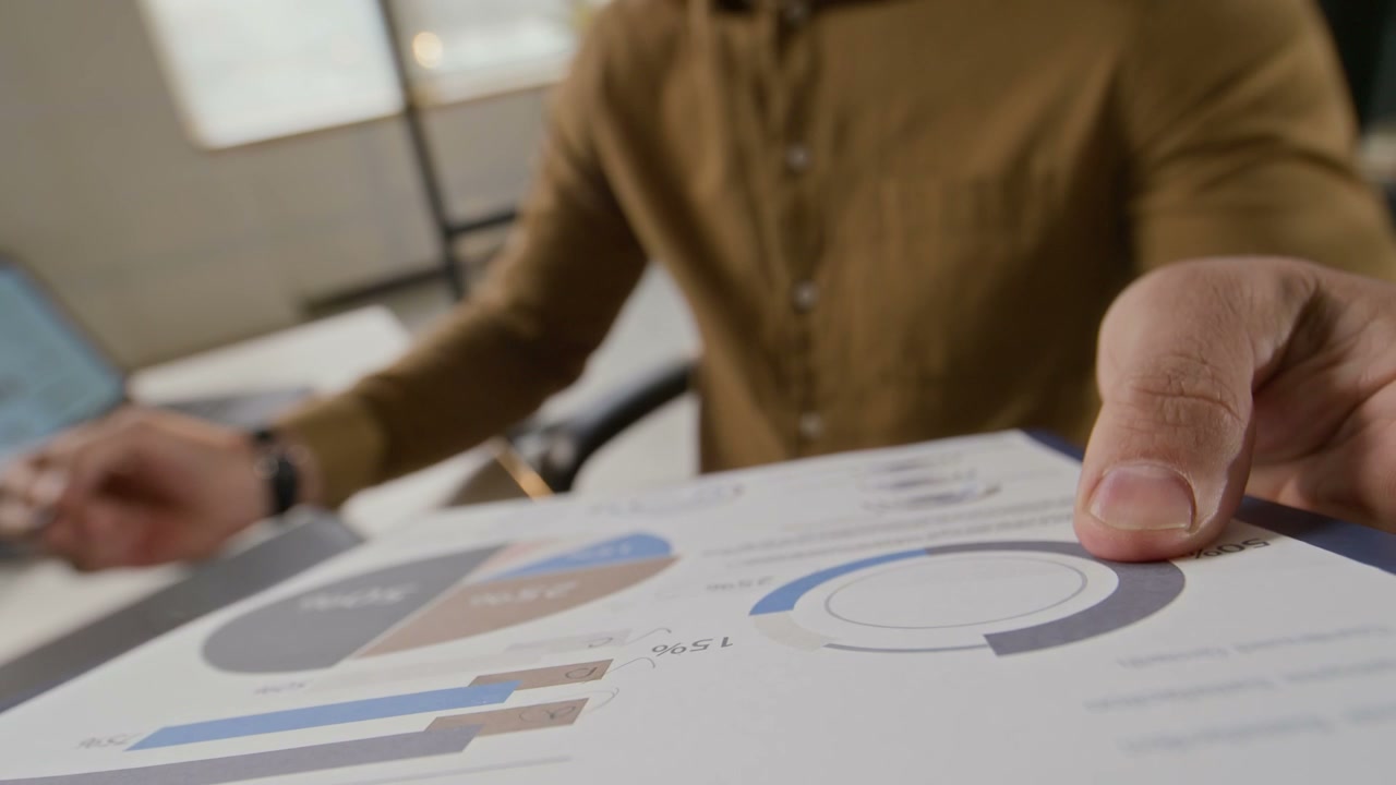 Man Reviewing Financial Report