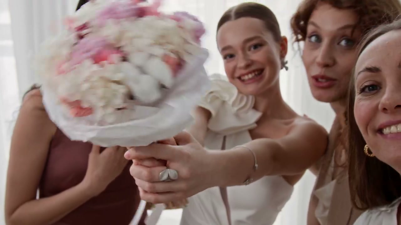 Happy Bride and Bridesmaids Posing for Selfie