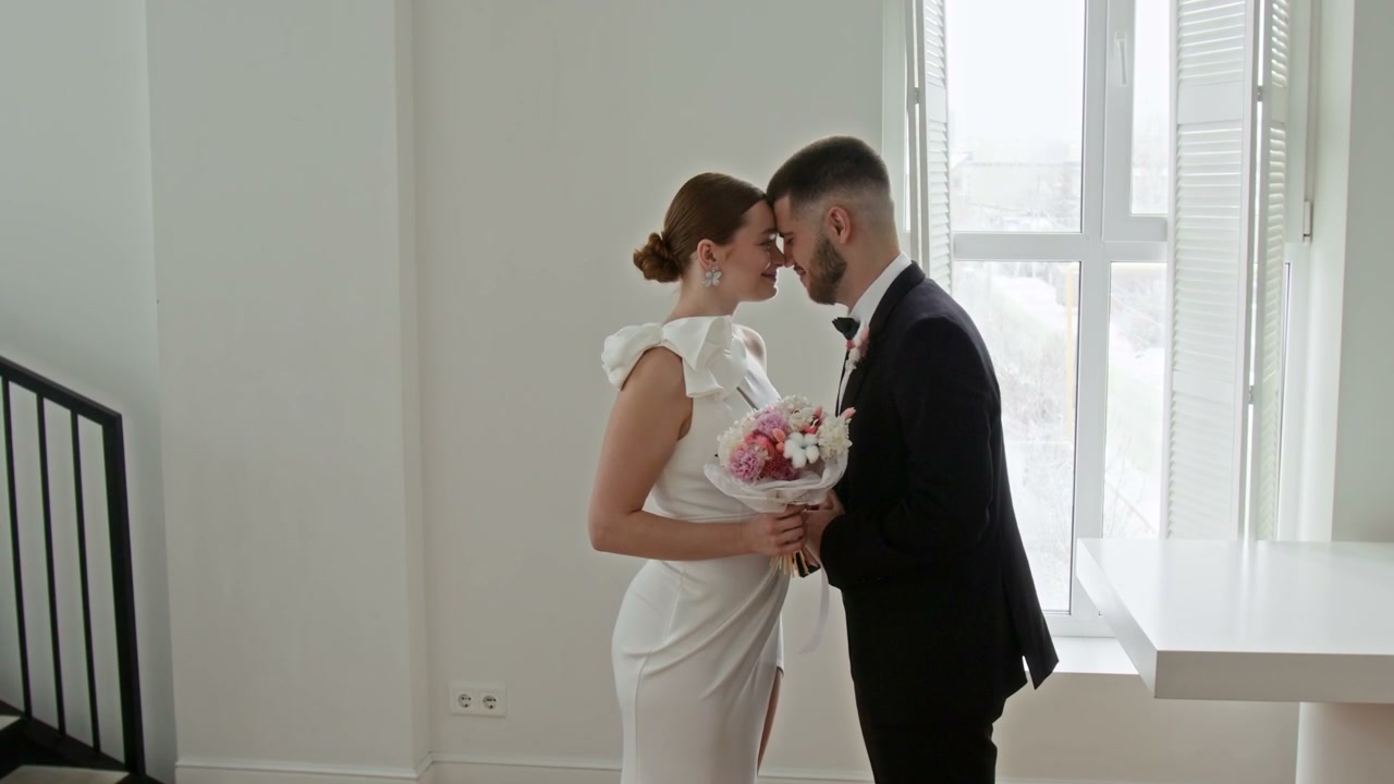 Bride and Groom Embracing on Wedding Day