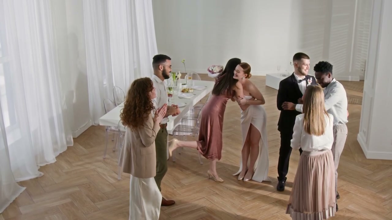 Newlyweds Greet Guests at Wedding Reception