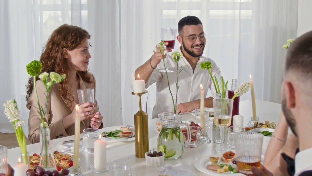 Wedding Guests Toasting During Dinner