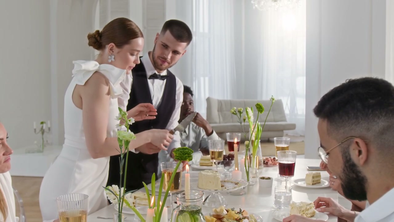 Wedding Couple Serving Cake to Guests