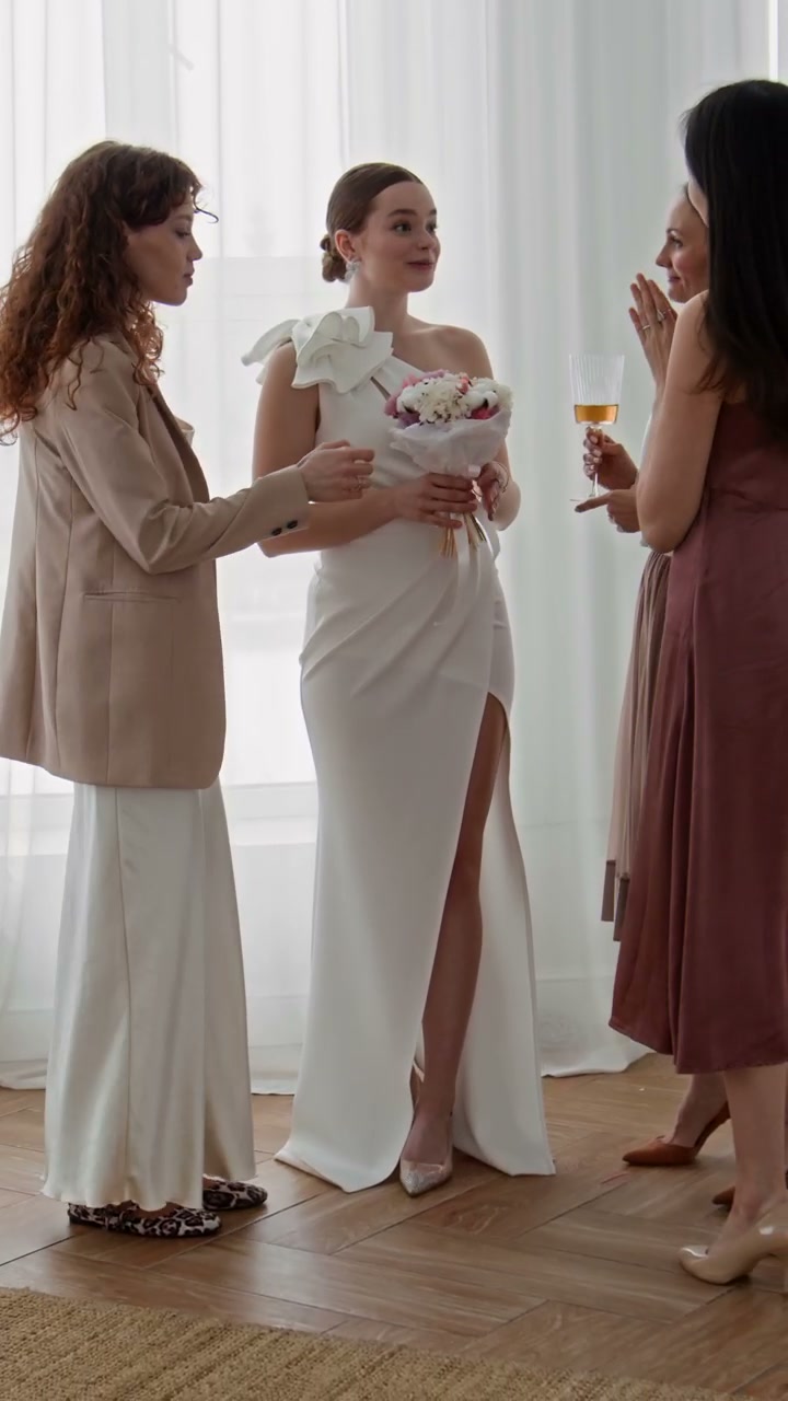 Bride and Bridesmaids Celebrating Wedding Day