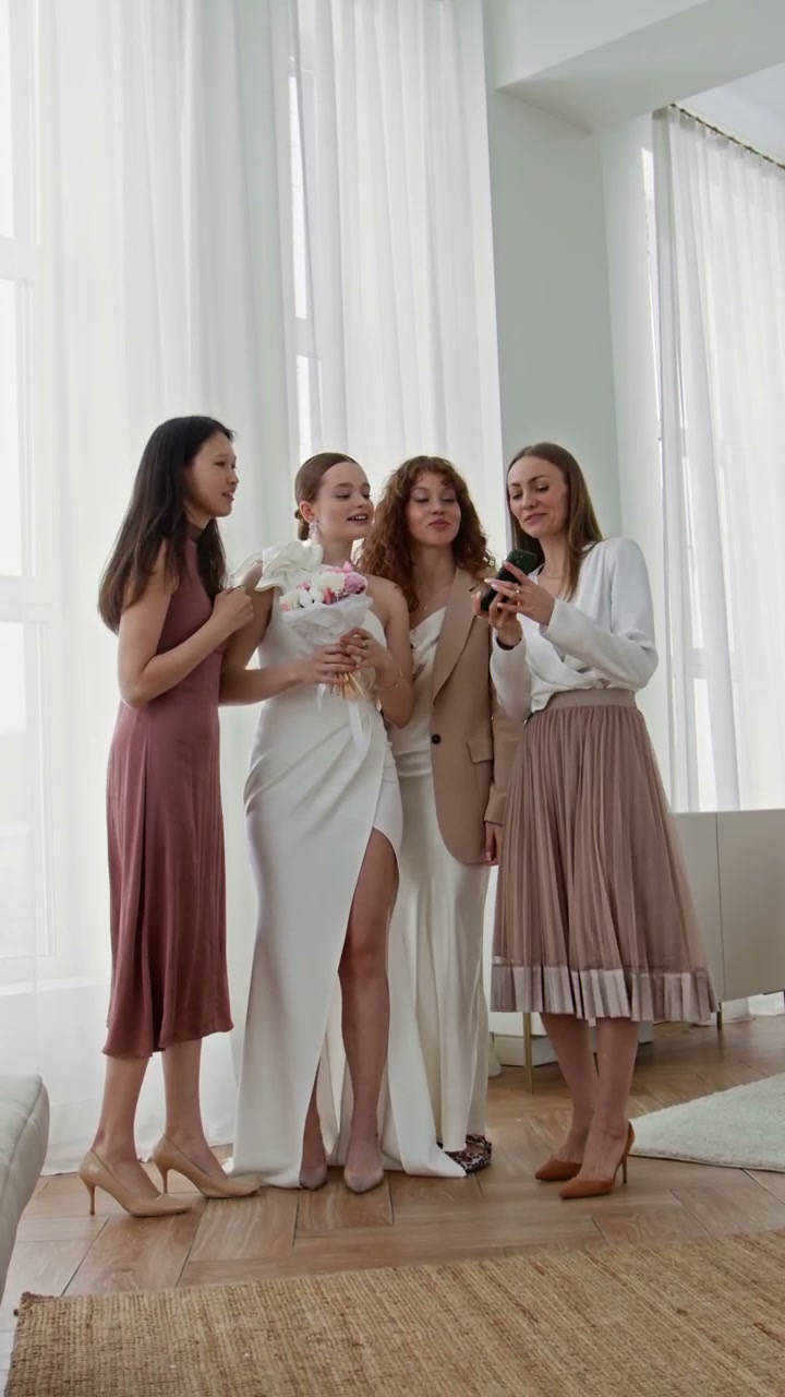 Bride and Bridesmaids Taking Wedding Selfie
