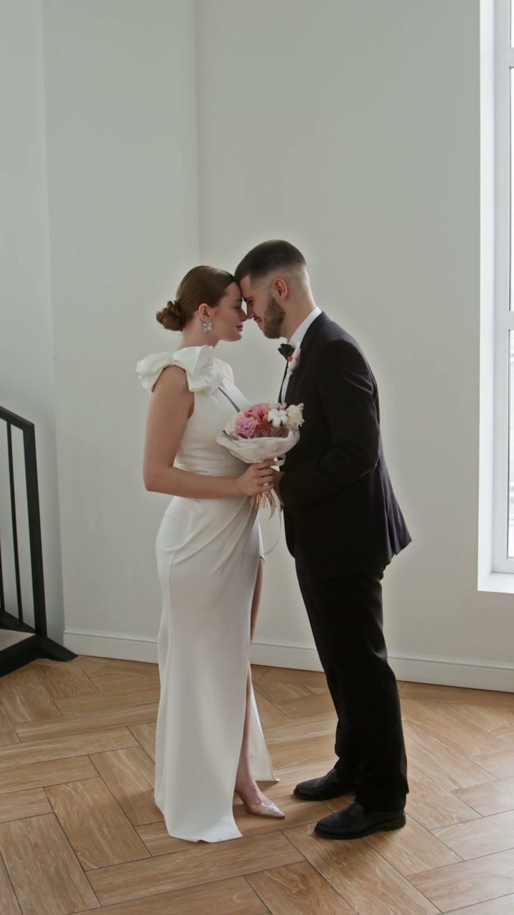 Newlyweds Embrace on Wedding Day