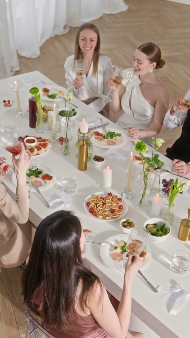 Wedding Guests Toasting at Formal Dinner