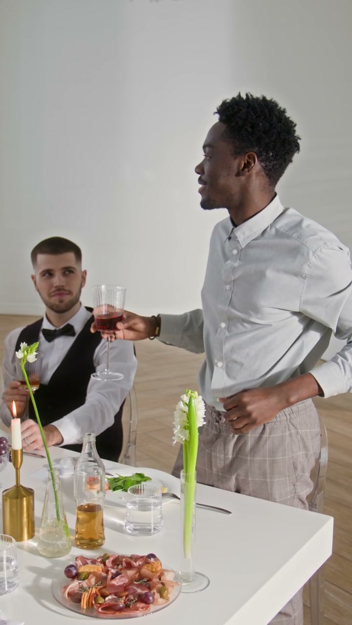 Man Toasts at Wedding Celebration Table