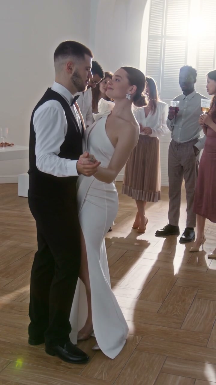 Newlyweds Slow Dancing at Wedding Celebration