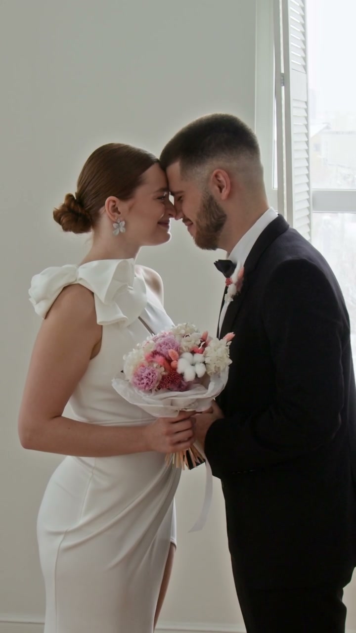 Bride and Groom Share Loving Embrace