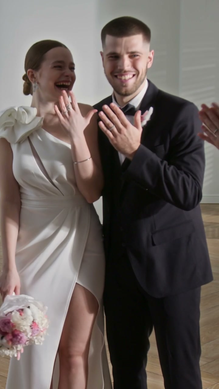 Happy Newlyweds Showing Wedding Rings