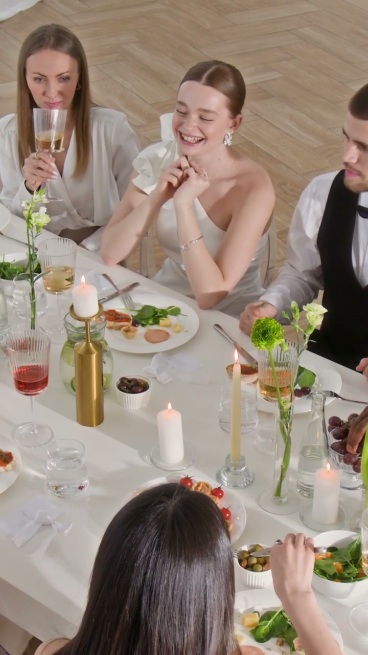 Wedding Guests Toasting at Celebration Dinner