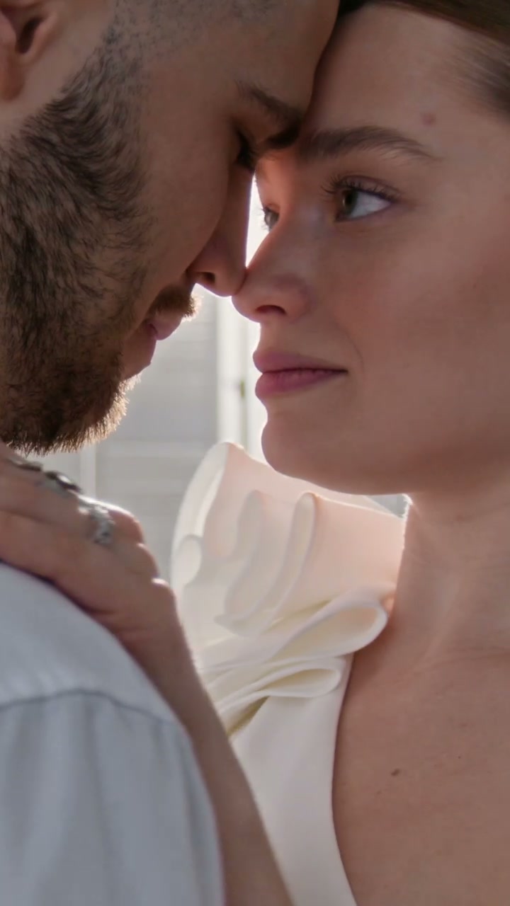 Close-up of Romantic Newlyweds Embracing
