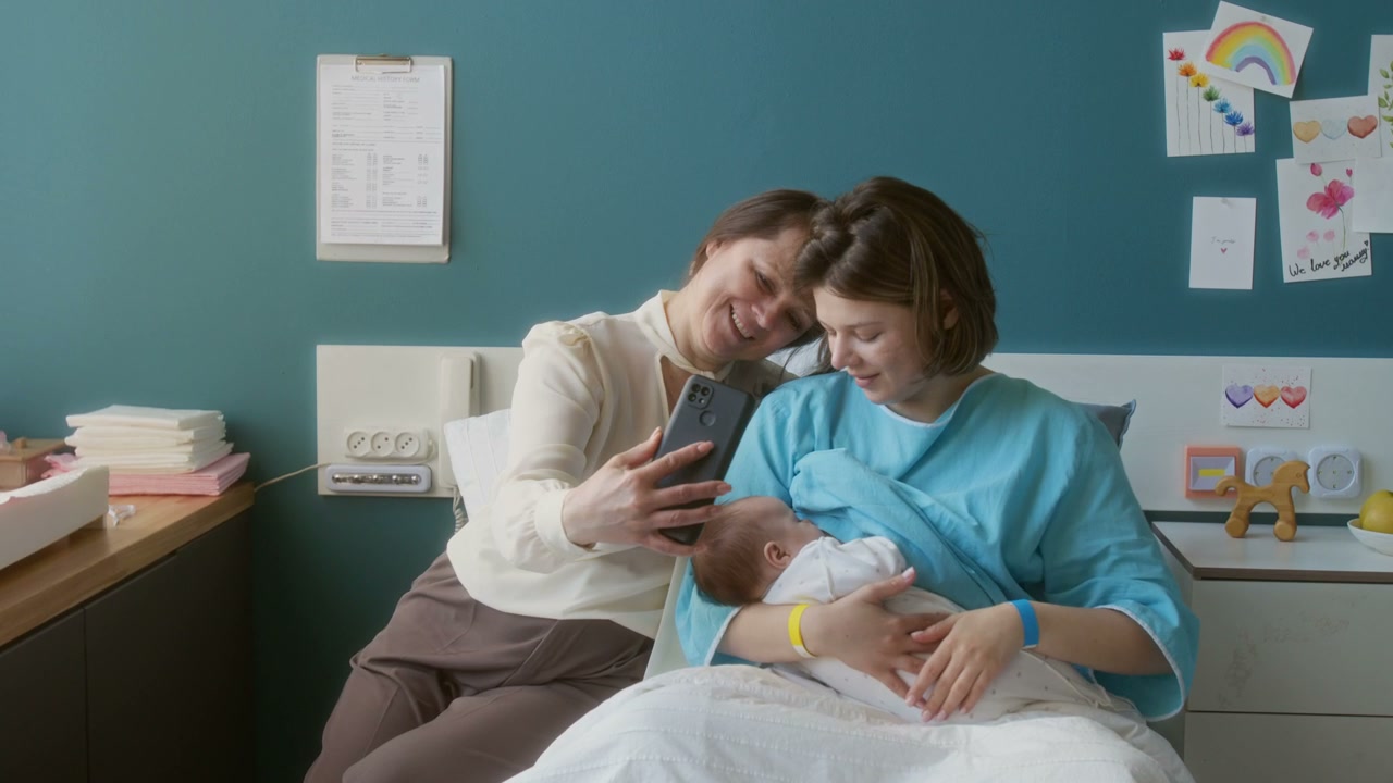 New Mother and Family Video Call with Baby