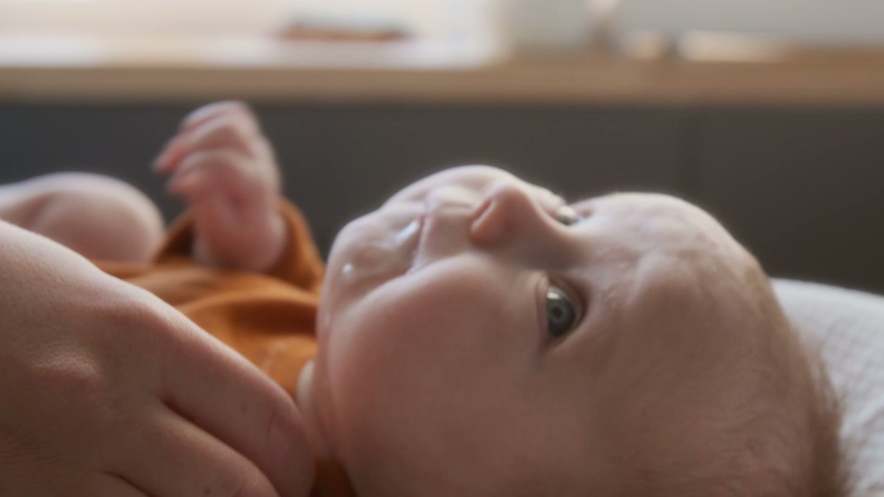 Newborn Baby Drooling While Being Wiped