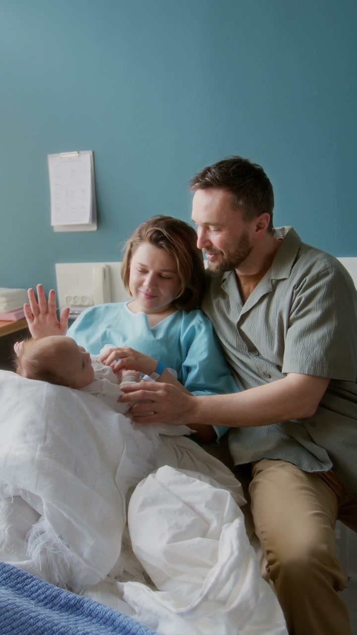 Parents Visit Newborn Baby in Hospital