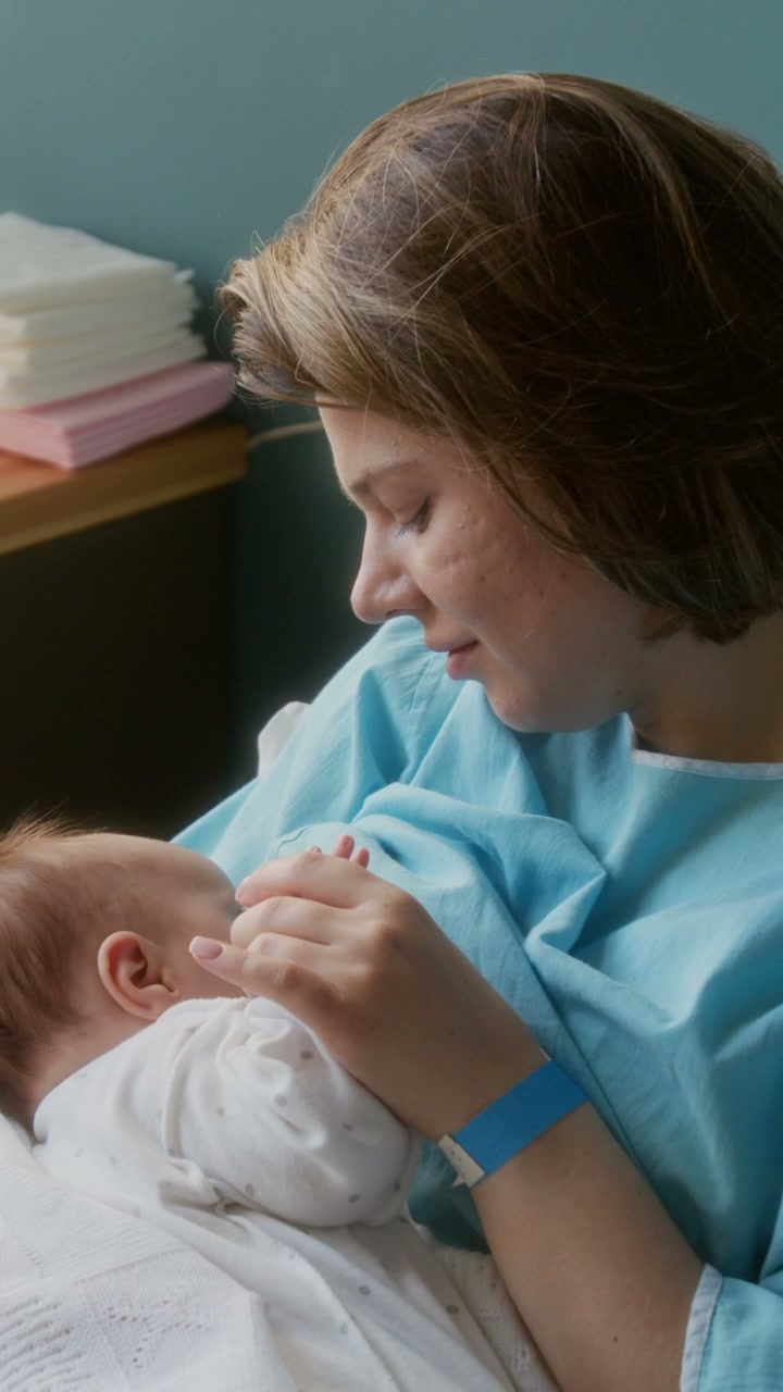 Mother and Newborn Baby Bonding in Hospital