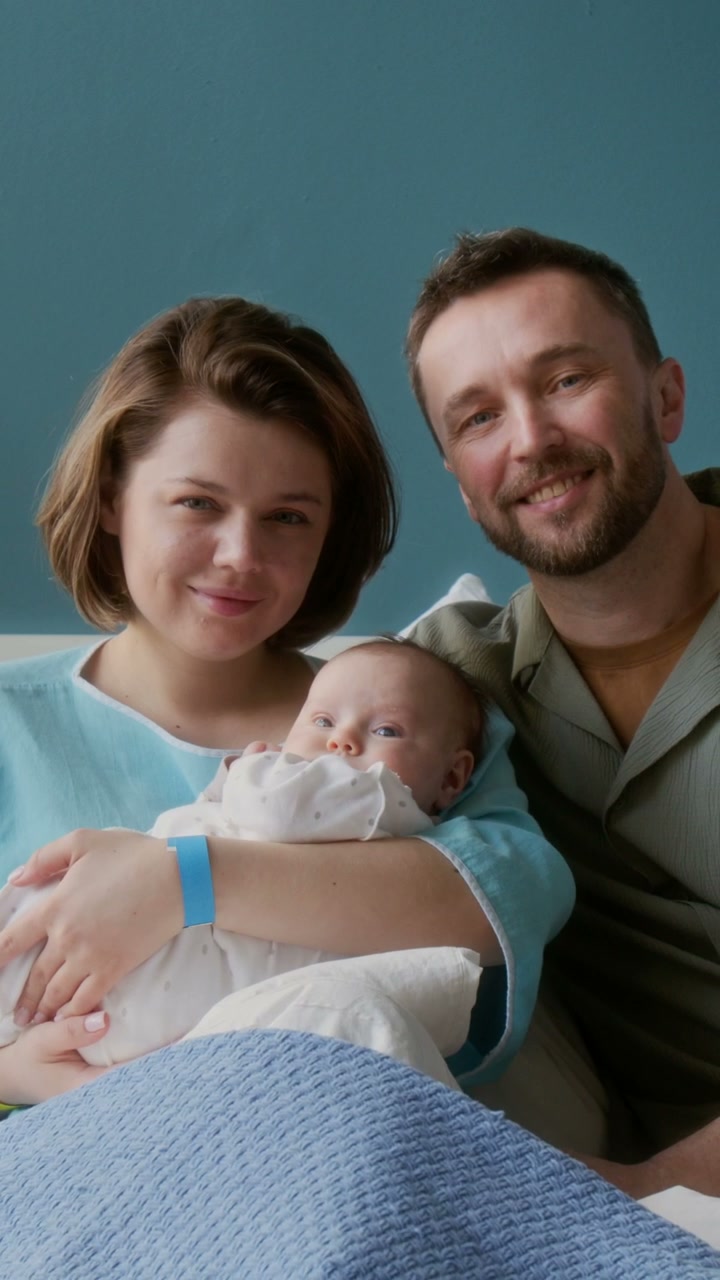 Happy Parents and Newborn Baby