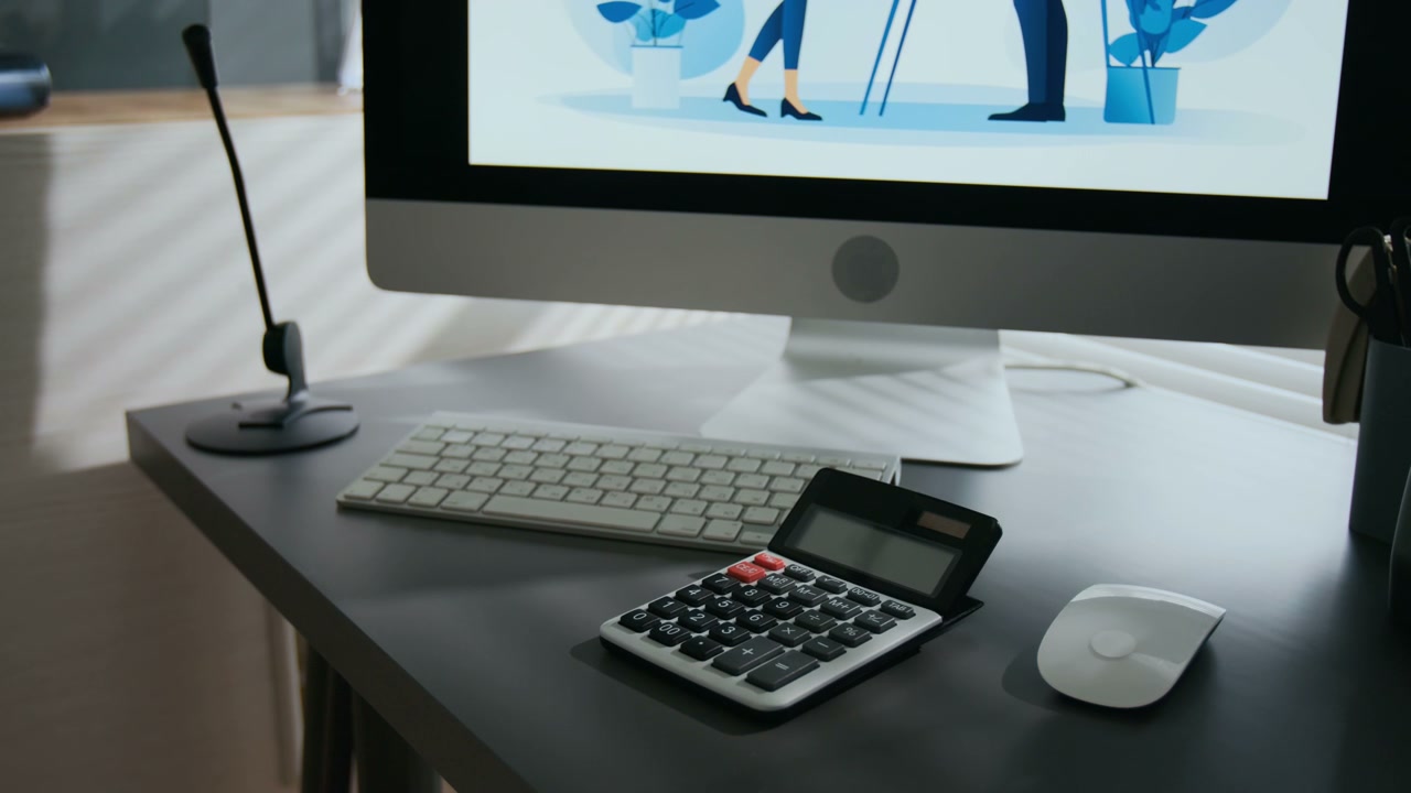 Modern Office Desk with Computer and Calculator