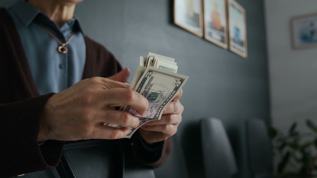 Person Counting US Dollar Bills