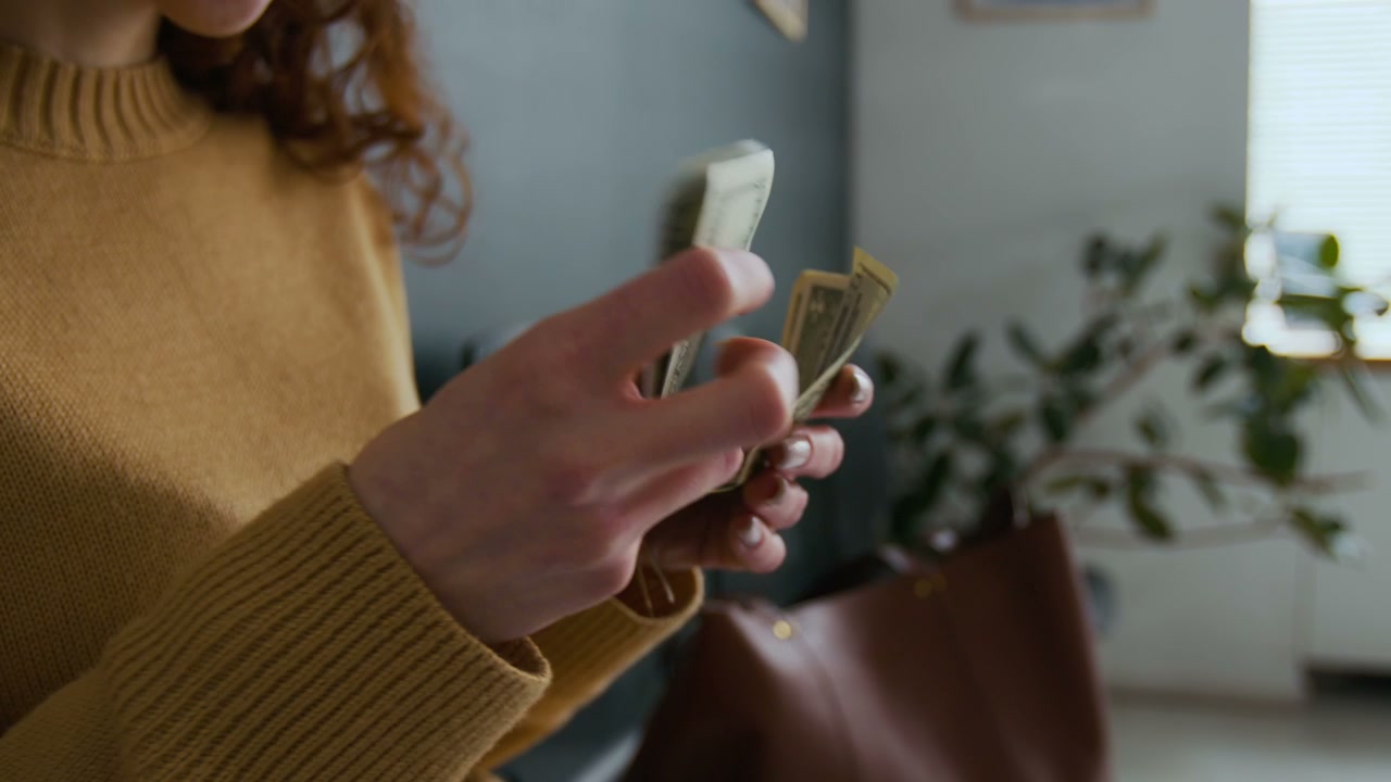 Person Counting US Dollar Bills