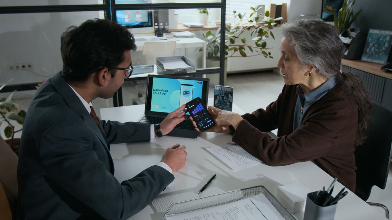 Financial Advisor Discussing with Client