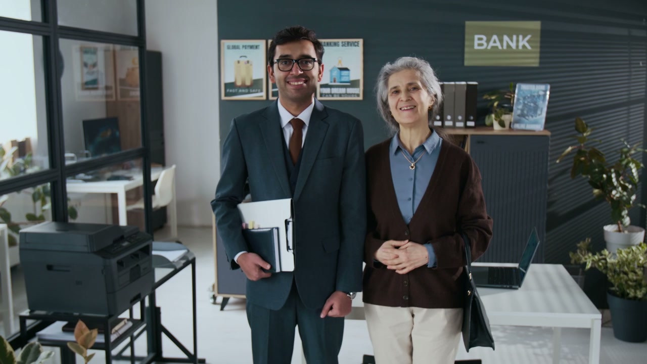 Smiling Banker and Customer in Office