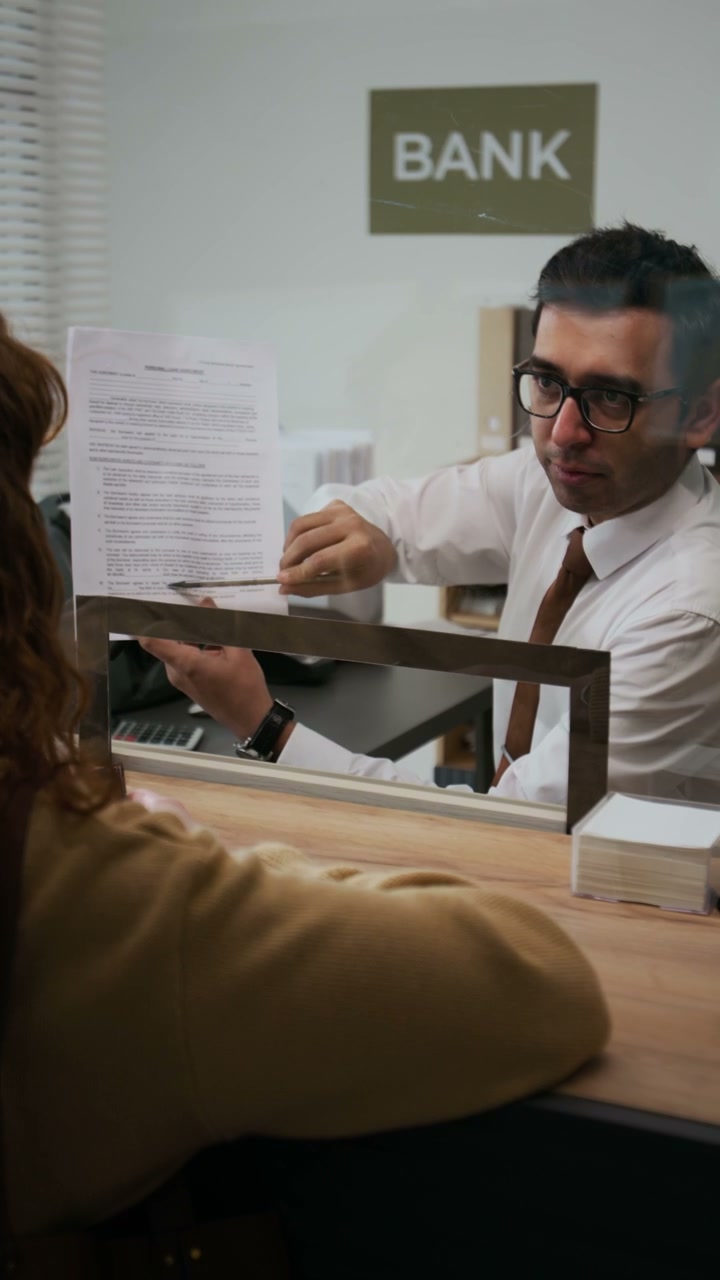 Financial Advisor Explains Loan to Customer