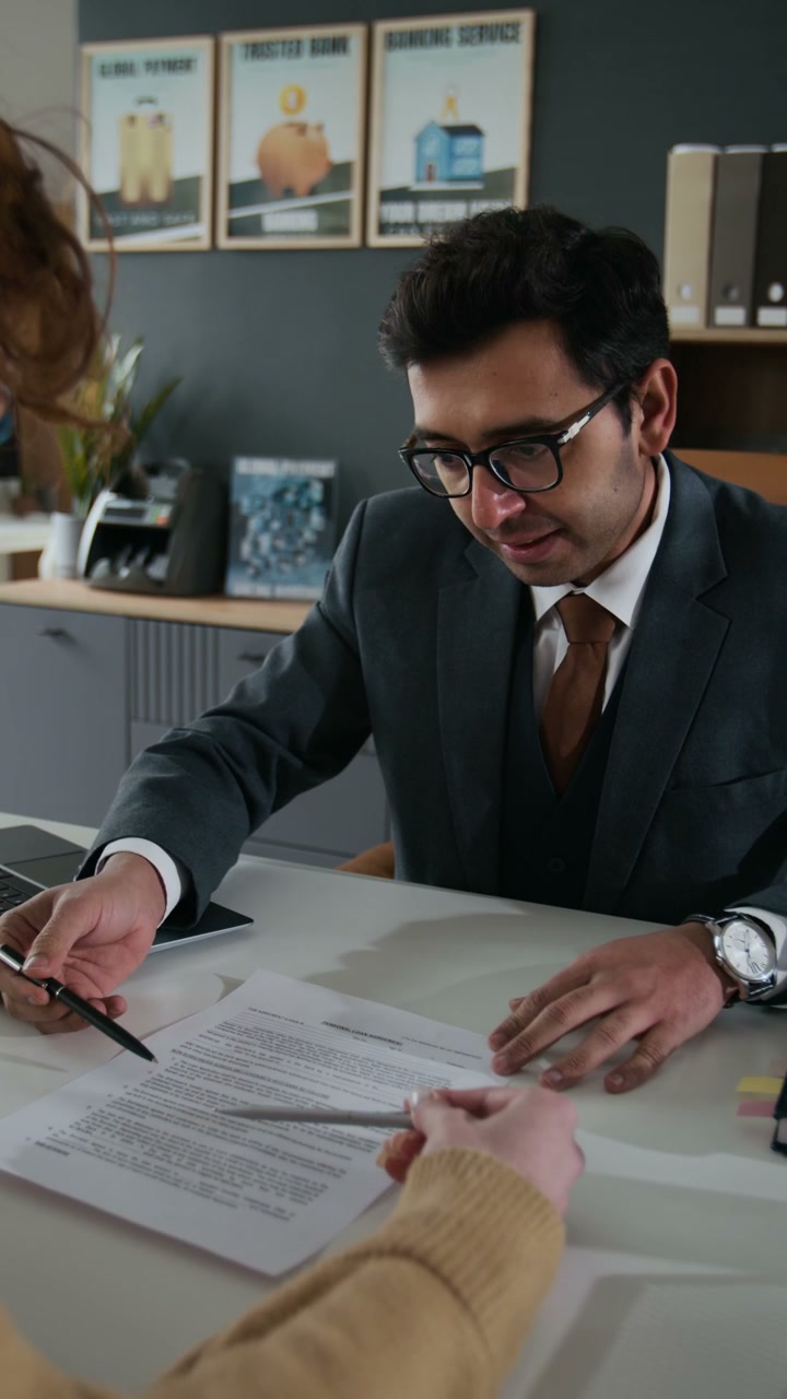 Bank Advisor Explaining Document to Client