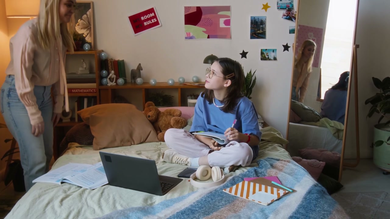 Mother Supports Daughter Doing Homework