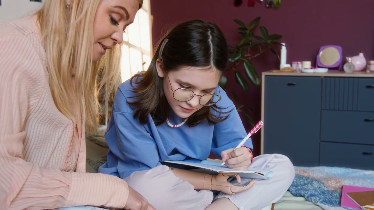 Mother Helping Daughter with Prosthetic Arm Study