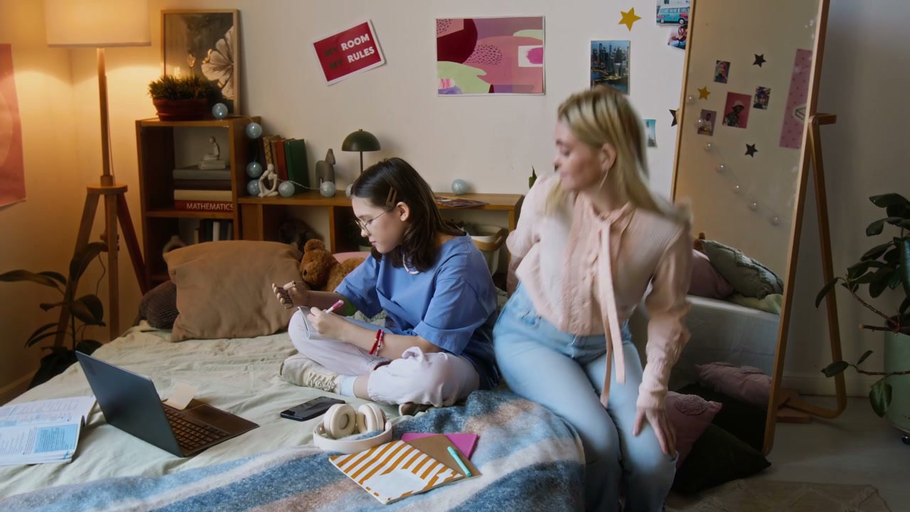Mother Supporting Daughter With Prosthetic Arm