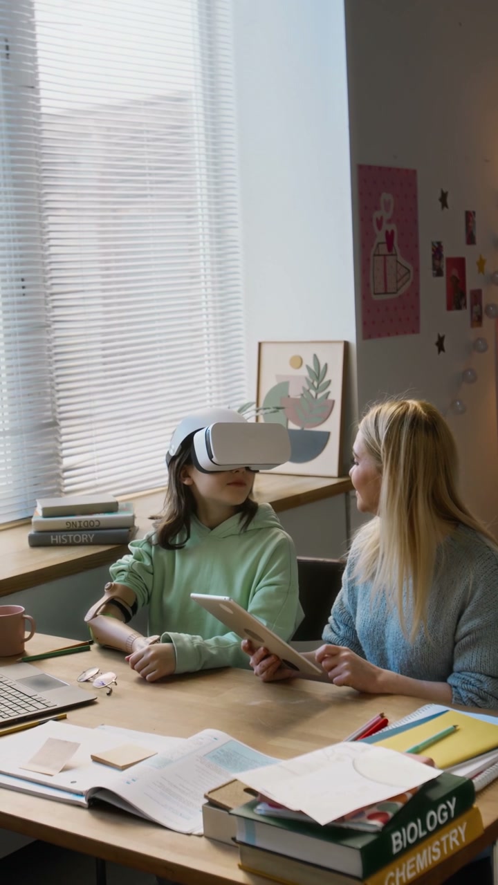 Girl with Prosthetic Arm Uses VR Headset with Mother